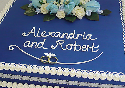 Blue and white iced engagement cake